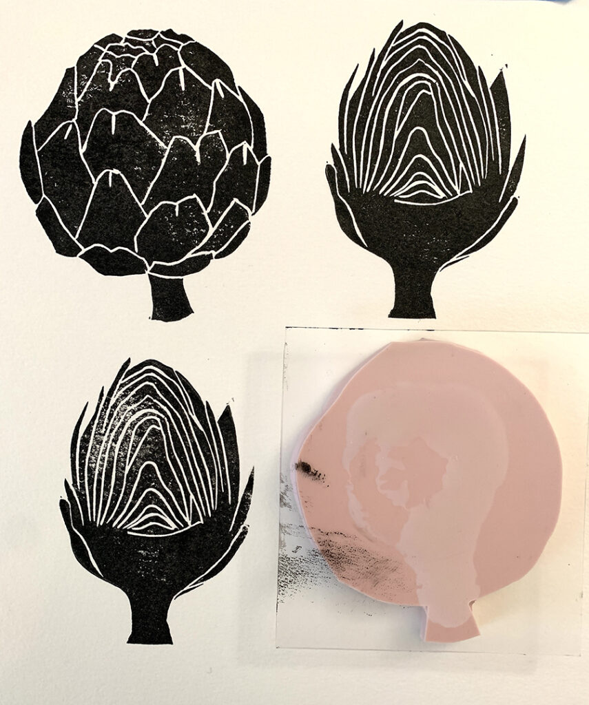 An image showing a piece of paper with block prints of an artichoke.