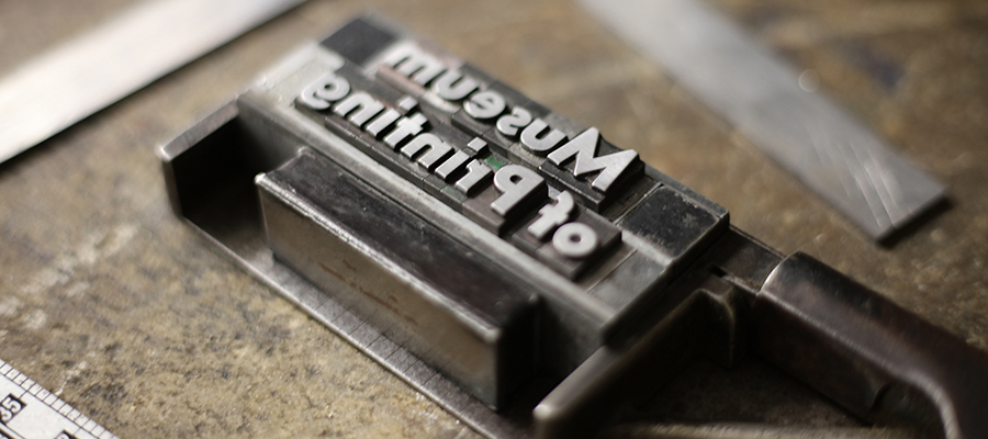 Photo of type ready for letterpress that reads Museum of Printing.|Type case full of wood type numbers and wingdings.|Close up of vintage typewriter keys.|Two images from the Museum of Printing. One is of a printing press