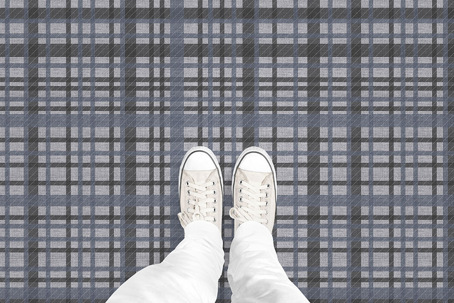 A birds eye view mockup of Design Pool pattern Awesome Plaid on vinyl flooring. 