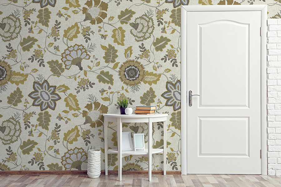 Design Pool pattern Tapestry Floral, a Jacobean design, mocked up on wallpaper in an entryway.