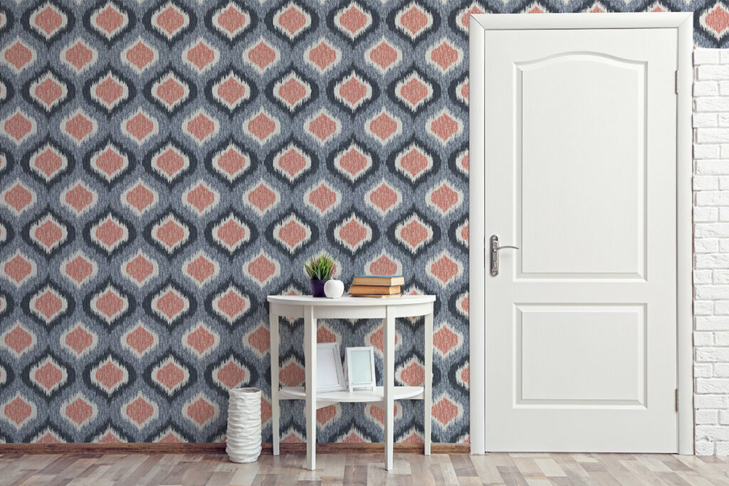 Design Pool pattern Dumai, an ogee with an ikat effect, shown on wallcovering.