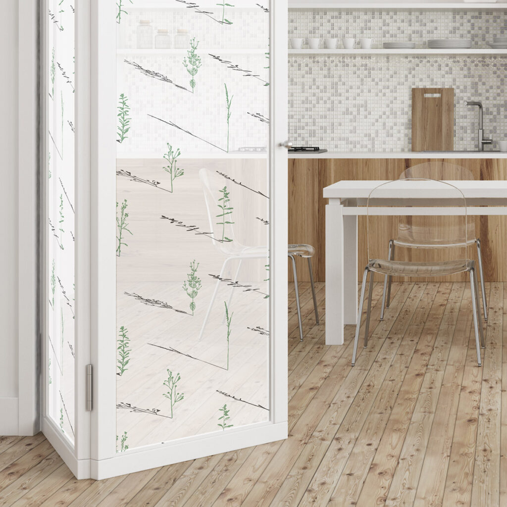 A break room in an office with a glass door open. On the glass door is woven window film printed with a Design Pool pattern.