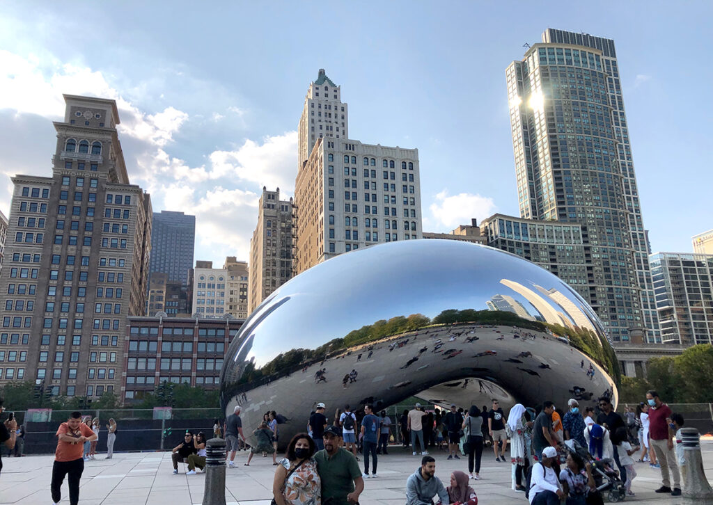 Cloud Gate with Chicago skyline.